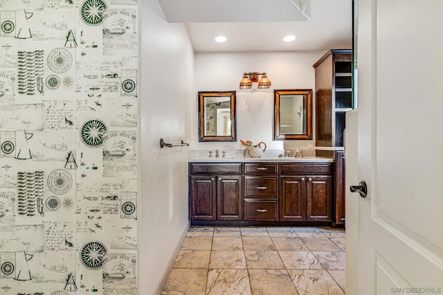 bathroom with vanity and walk in shower