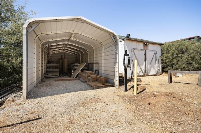 view of outdoor structure with a carport