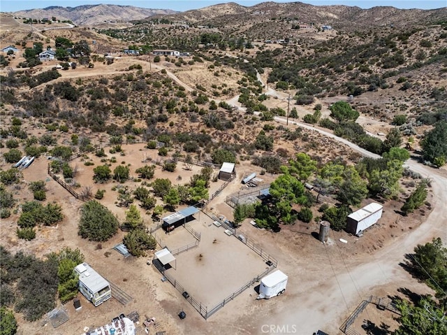 birds eye view of property featuring a mountain view