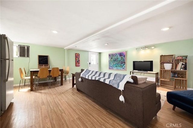 living room with light hardwood / wood-style floors