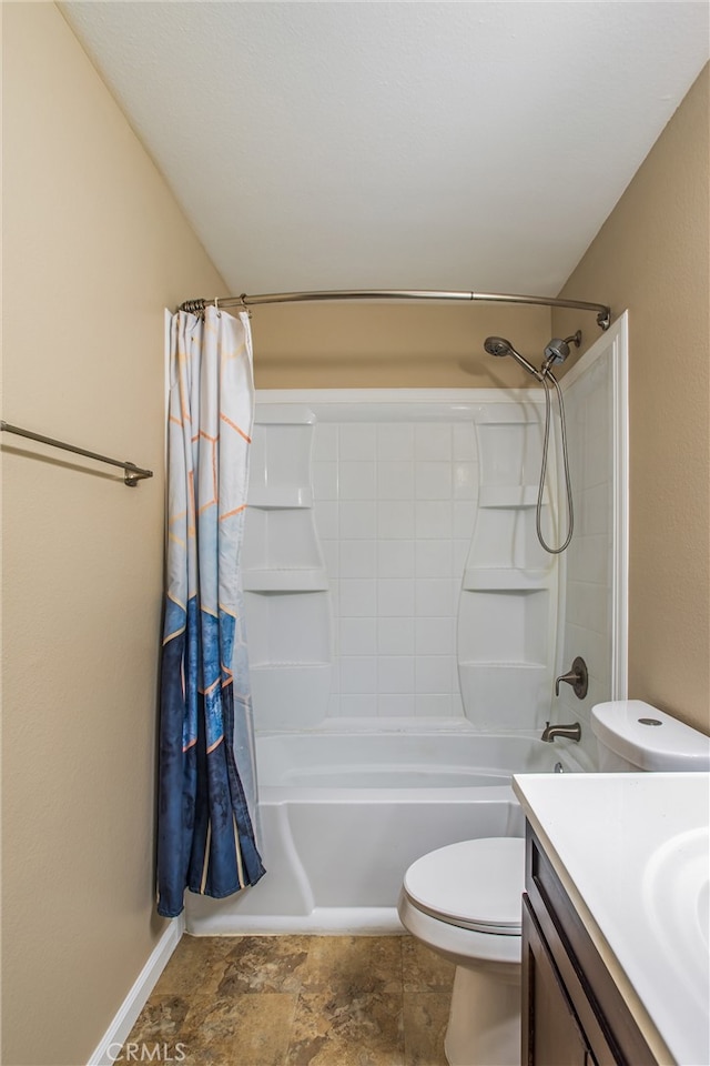 full bathroom with shower / bath combo, vanity, and toilet