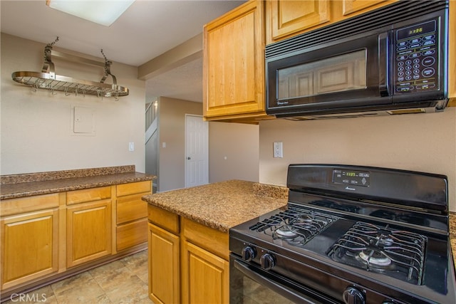 kitchen with black appliances