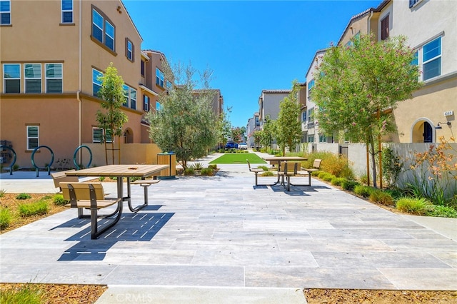 view of home's community featuring a patio