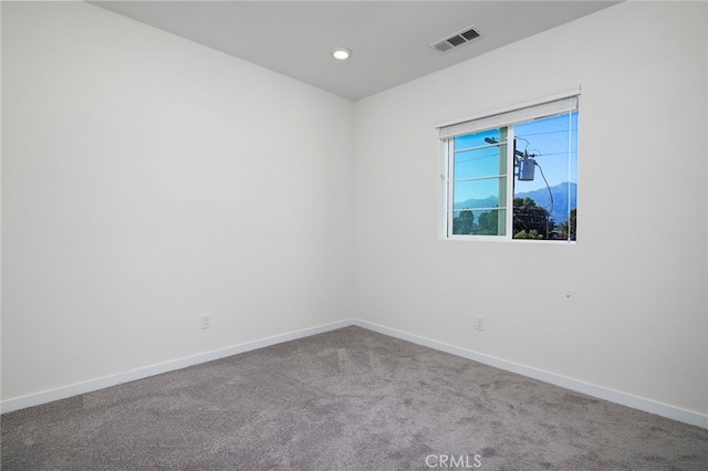 view of carpeted spare room