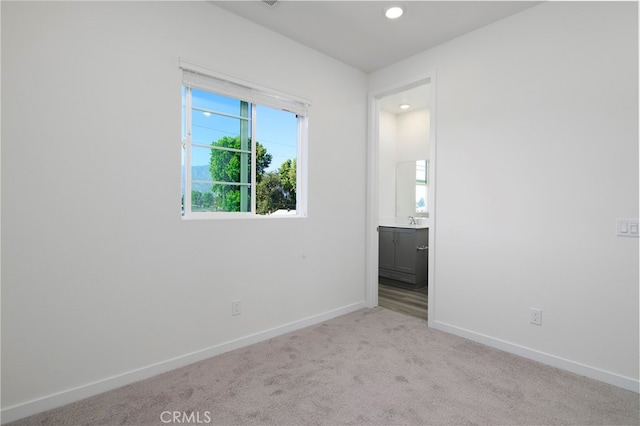 view of carpeted spare room