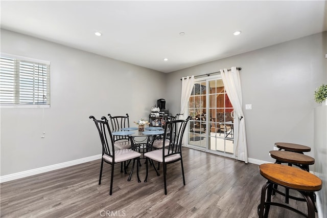 dining area featuring wood-type flooring