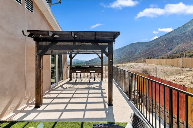 view of patio featuring a mountain view