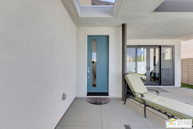 doorway to property with french doors