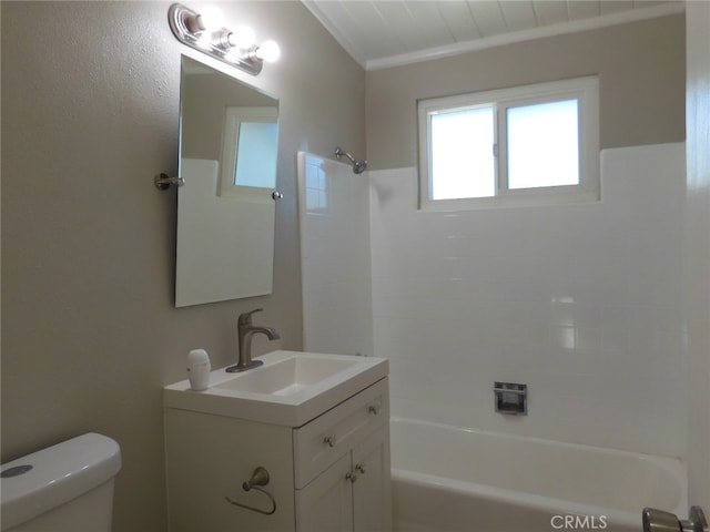 full bathroom with shower / bathing tub combination, ornamental molding, vanity, and toilet