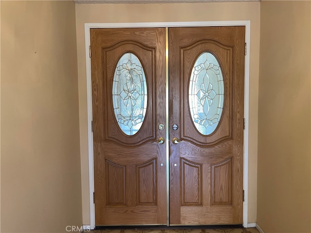 foyer featuring french doors