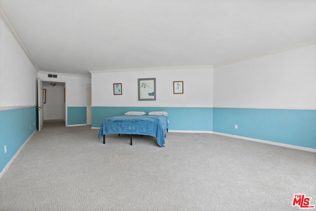 bedroom with carpet and crown molding