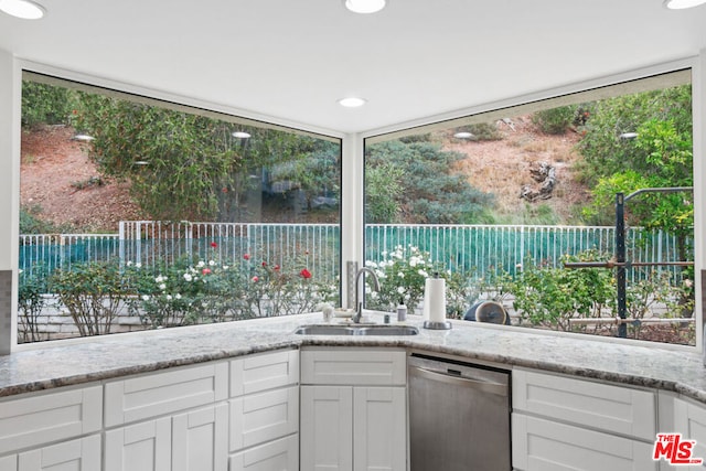 view of patio with sink and exterior kitchen