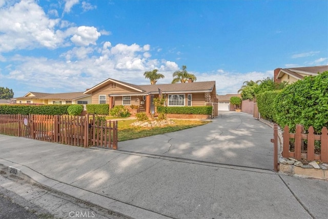 ranch-style home featuring a garage