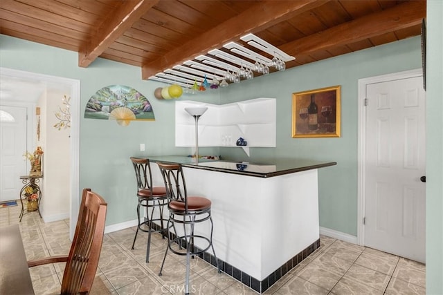 bar with wooden ceiling and beam ceiling