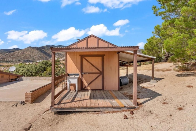 view of outdoor structure with a mountain view