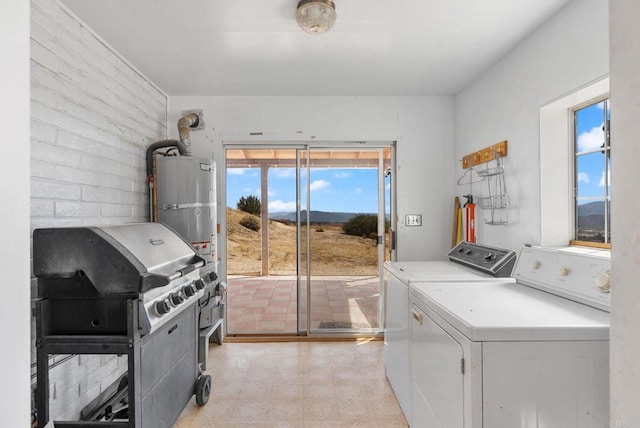 washroom featuring independent washer and dryer