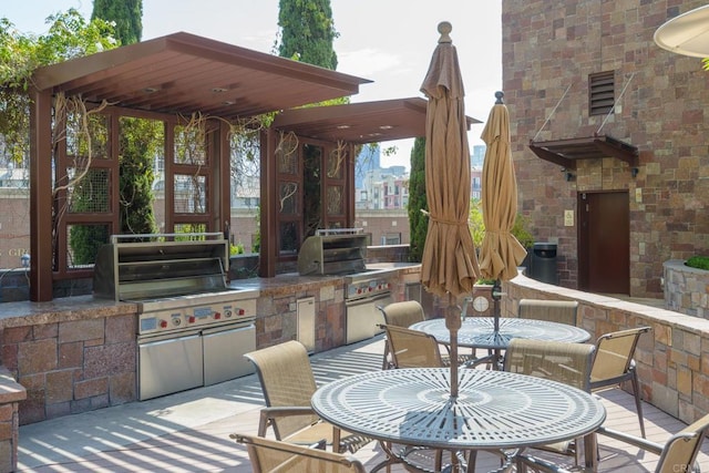 view of patio with exterior kitchen