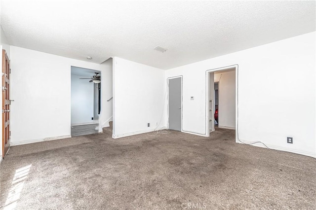 11 Hickock Ln, Carson, CA 90745 - unfurnished bedroom featuring carpet floors, a textured ceiling, and baseboards