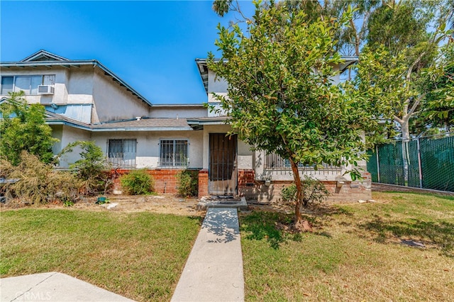 view of front of property with a front yard