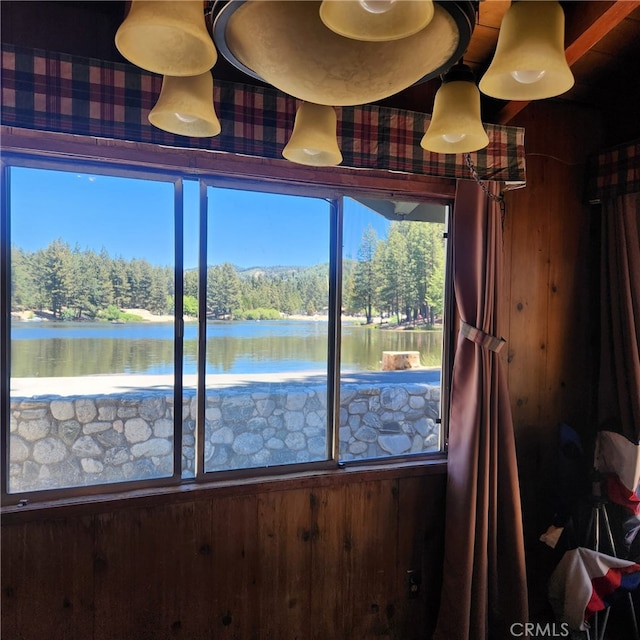 interior details with a water view and wood walls