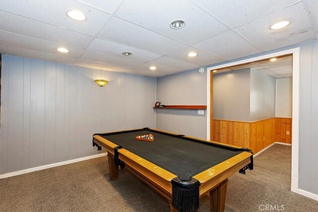 rec room featuring carpet, wooden walls, billiards, and a paneled ceiling