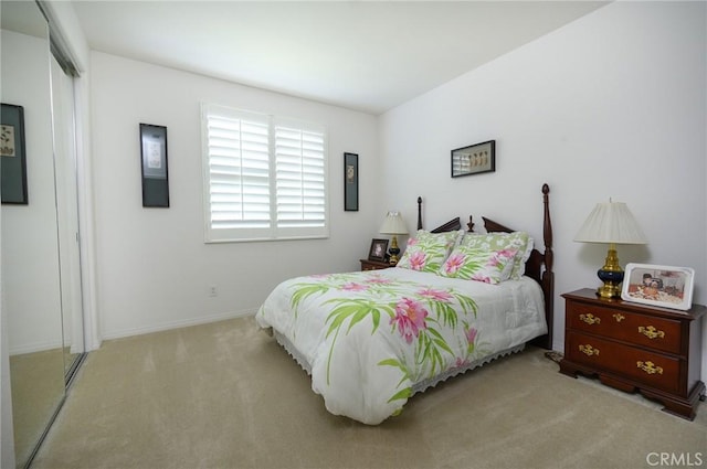 carpeted bedroom featuring a closet