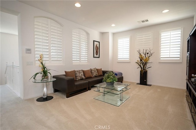 living room with light colored carpet