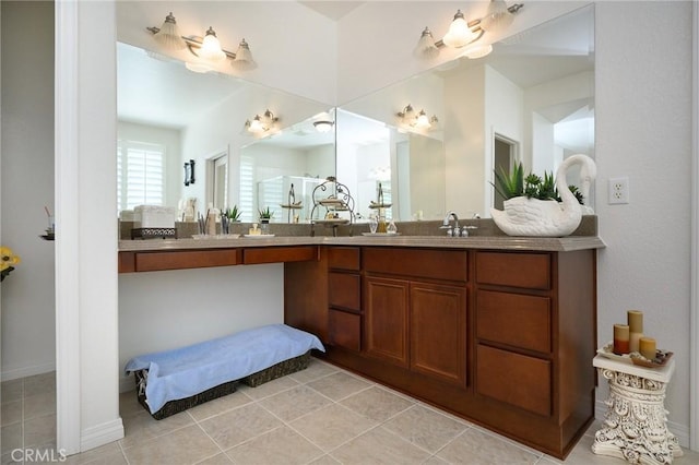 bathroom with tile patterned flooring, an enclosed shower, and vanity