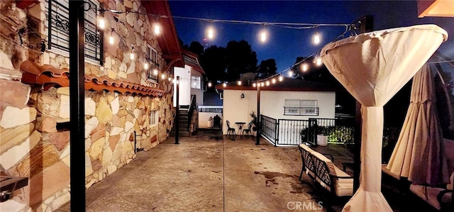 view of patio at night