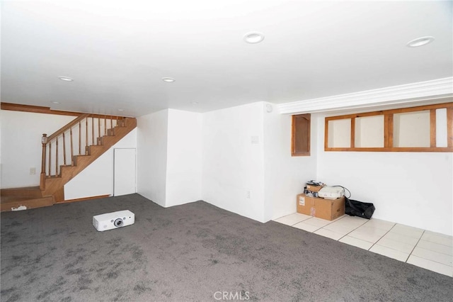 basement with light carpet