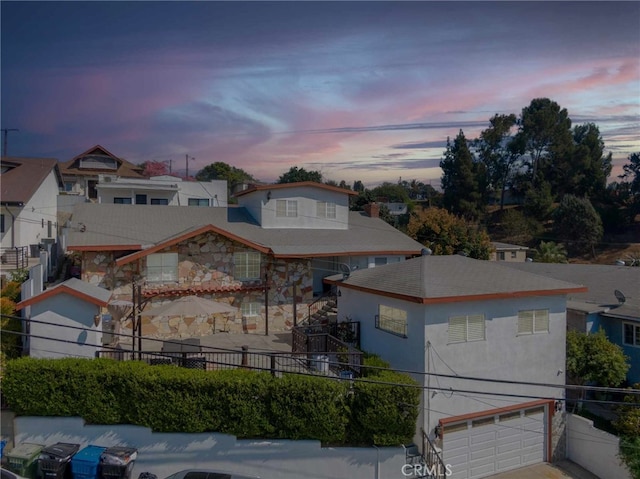 view of front of property featuring a garage