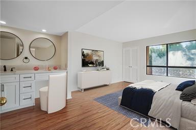 bedroom featuring light wood-type flooring