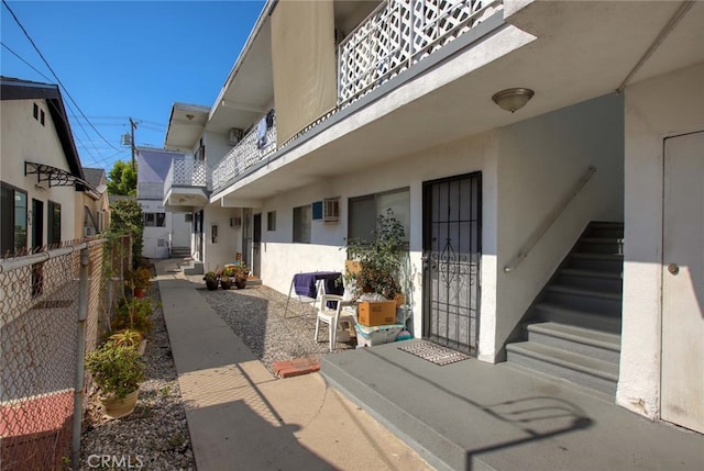 exterior space featuring a balcony and a patio