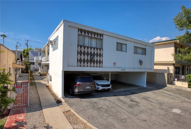 view of property featuring a carport