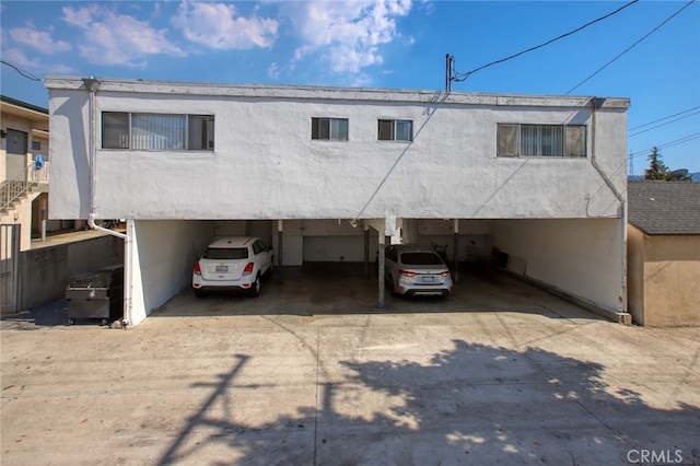 view of front of house featuring a carport