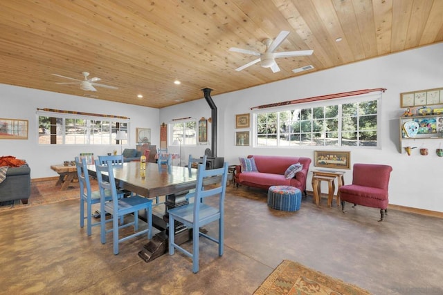 dining space featuring wood ceiling and ceiling fan