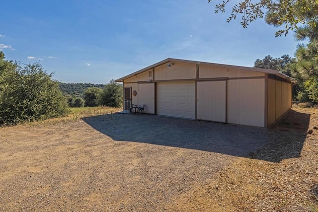 garage with wood walls