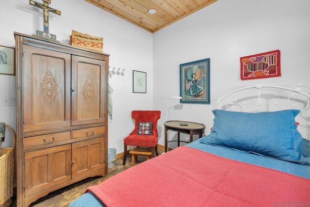 bedroom with carpet, wood ceiling, and lofted ceiling