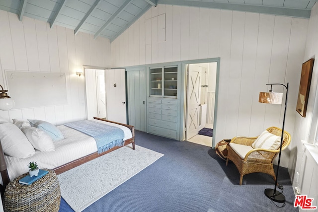 carpeted bedroom featuring wood walls, beam ceiling, and high vaulted ceiling