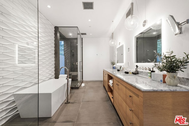 bathroom featuring plus walk in shower and vanity