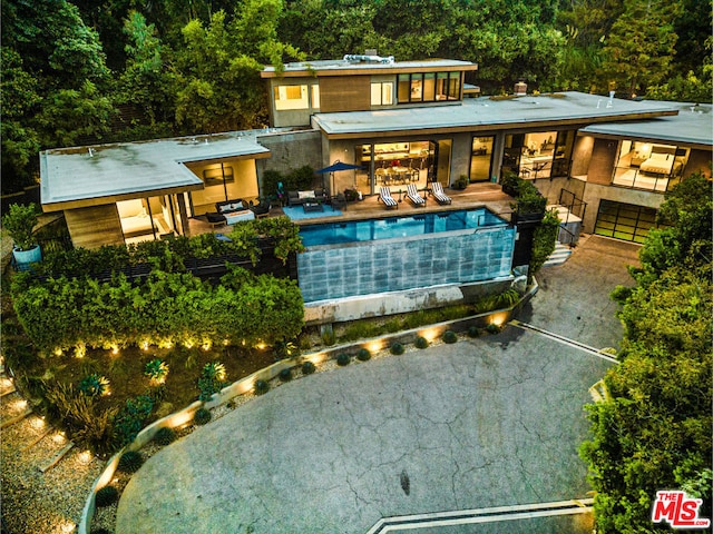 rear view of house with a patio