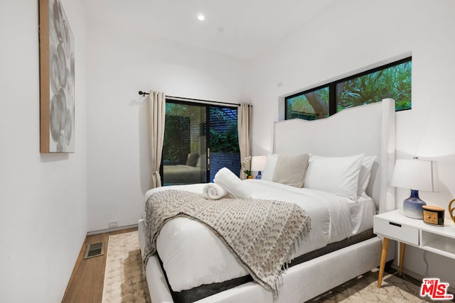 bedroom featuring light wood-type flooring