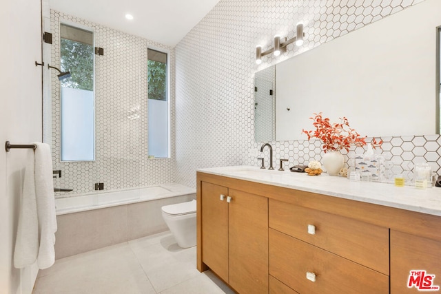 full bathroom with vanity, shower / bathtub combination, tile patterned floors, toilet, and decorative backsplash