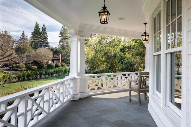 balcony featuring covered porch