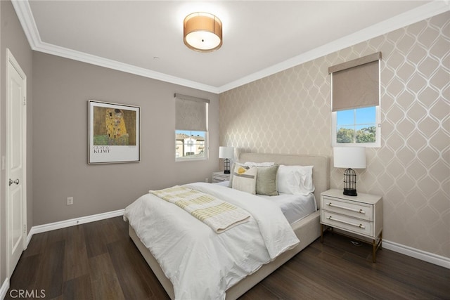 bedroom featuring ornamental molding and dark hardwood / wood-style floors