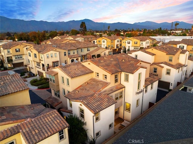 aerial view at dusk with a mountain view