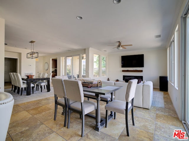 dining room with ceiling fan