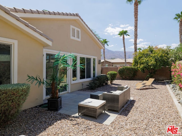 view of patio / terrace with a mountain view