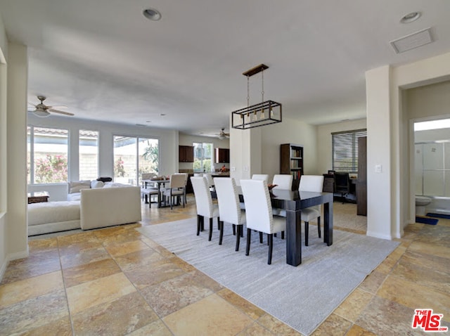 dining space with ceiling fan