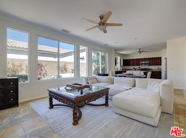 living room with ceiling fan